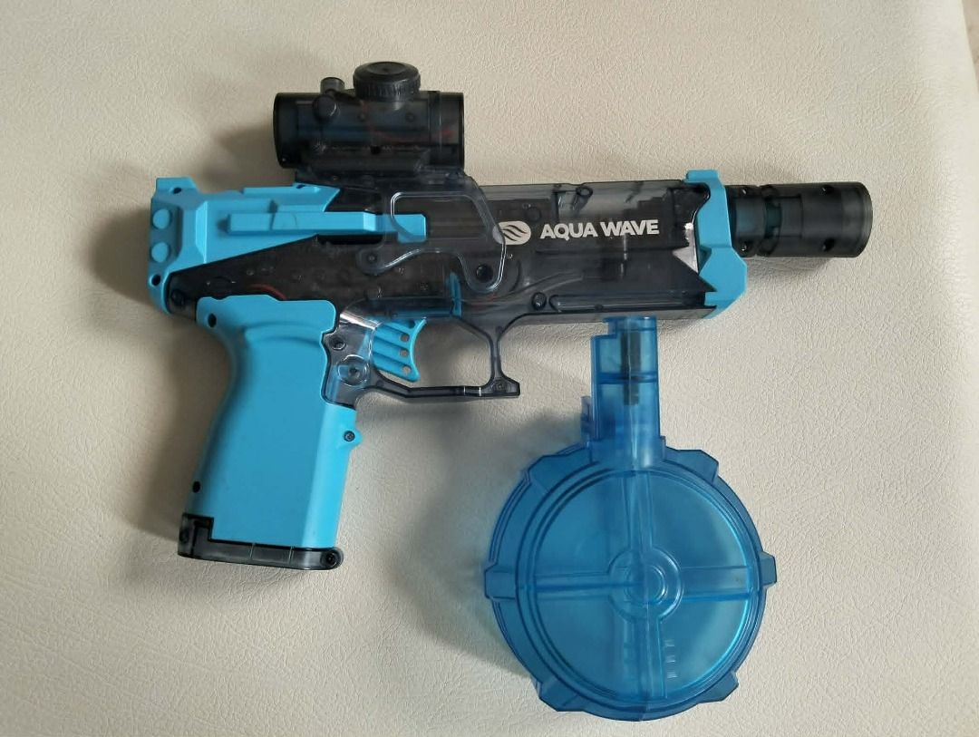 Aqua Wave automatic and rechargeable water gun bundle (Category: Kids Toys) located in Quezon City. Submitted by cion_017 (Listing ID 1466349538, Image 1). Description: For bundle SALE! - Product: Aqua Wave Water Gun - Capacity: Includes a large round blue drum magazine - Best For: Backyard water fights and outdoor fun.