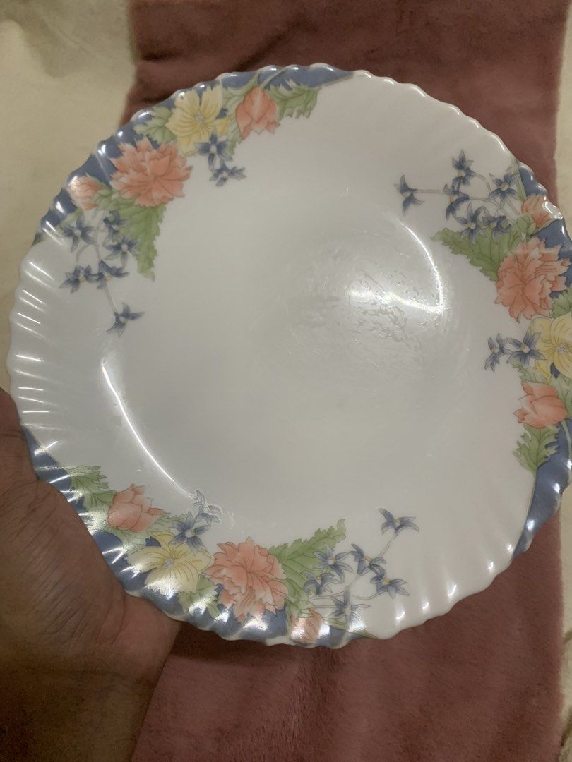 Arcopal Florine Dinner Plates 2pcs (Category: Dinnerware & Cutlery) located in Las Pinas. Submitted by erd17declutters (Listing ID 1466559246, Image 2). Description: These are Arcopal Florine Dinner Plates, featuring a vintage French floral design on durable white opal glass. Plate Details • Arcopal Florine Dinner Plates: This pattern features pastel pink, orange, and yellow flowers with green leaves and a distinctive blue-tinted scalloped rim. •