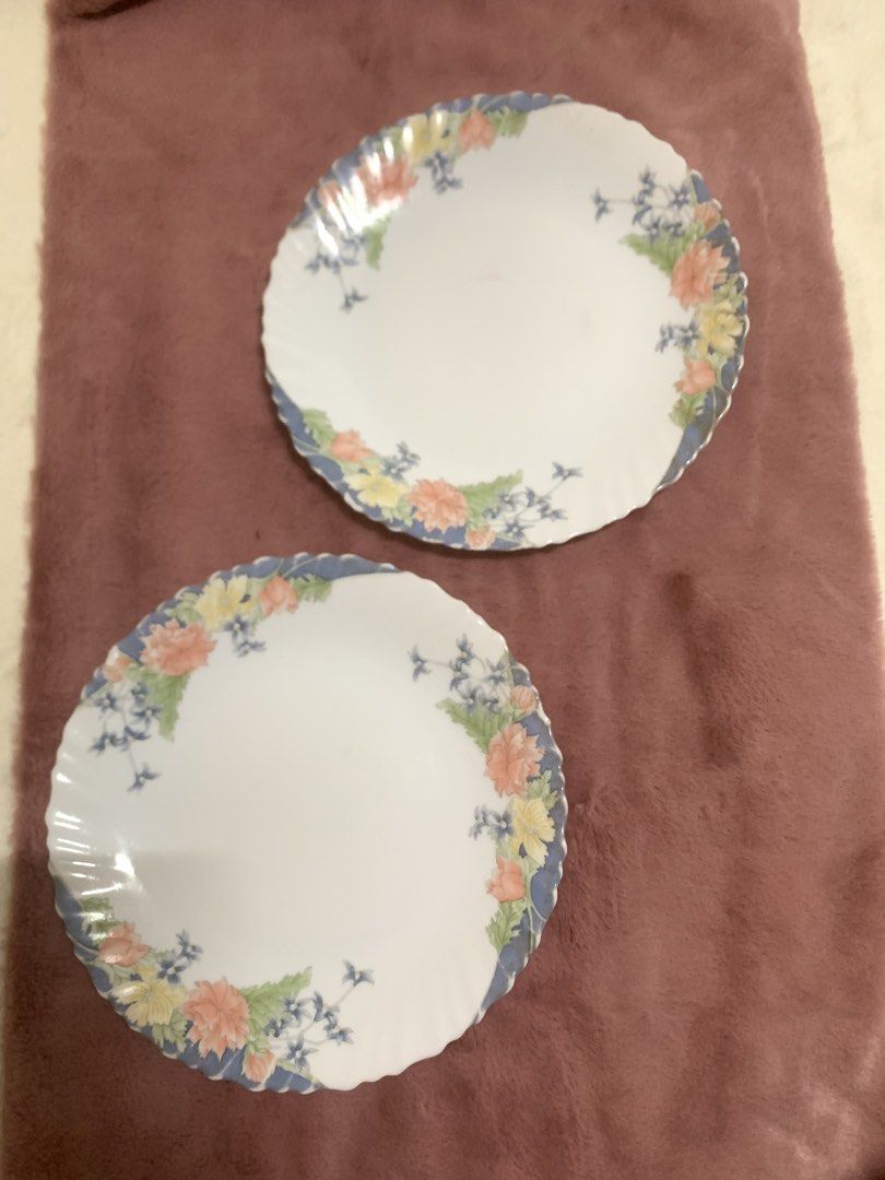 Arcopal Florine Dinner Plates 2pcs (Category: Dinnerware & Cutlery) located in Las Pinas. Submitted by erd17declutters (Listing ID 1466559246, Image 3). Description: These are Arcopal Florine Dinner Plates, featuring a vintage French floral design on durable white opal glass. Plate Details • Arcopal Florine Dinner Plates: This pattern features pastel pink, orange, and yellow flowers with green leaves and a distinctive blue-tinted scalloped rim. •