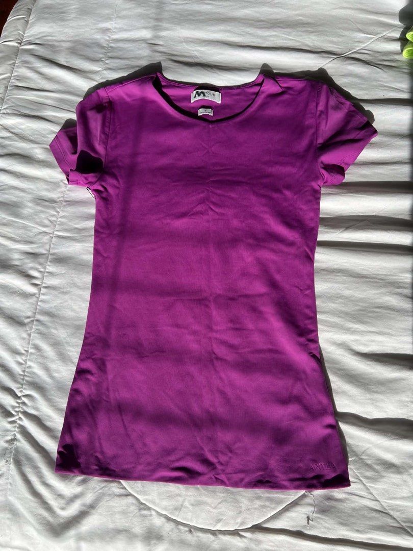 Aritzia activewear tshirt (Category: Activewear) located in Makati City. Submitted by yupangcoem67324 (Listing ID 1466419720, Image 1). Description: - Brand: Aritzia Contour - Color: Vibrant magenta pink - Size: Small - Style: Short sleeves, round neckline - Material: Soft ribbed stretch fabric - Details: Subtle embossed Aritzia logo near the bottom hem - Condition: Clean and ready to wear.