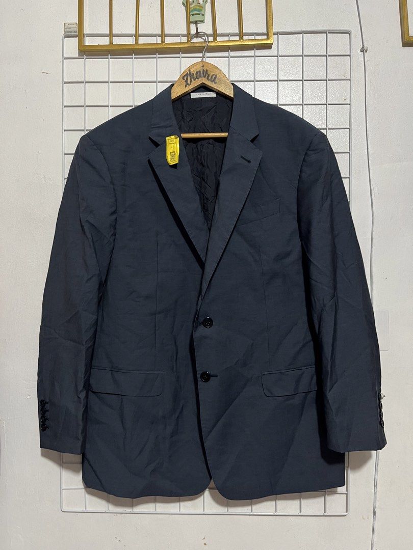 Armani Collezioni G Line Suit Jacket Blazer (Category: Coats, Jackets and Outerwear) located in Pagsanjan. Submitted by zhairaaaaa (Listing ID 1466479951, Image 2). Description: - Brand: Armani Collezioni (G Line) - Color: Dark charcoal grey - Origin: Made in Italy - Material: High-quality wool blend - Design: Classic two-button closure, notched lapels, front flap pockets, single back vent - Interior: Fully lined with internal pockets - Condition