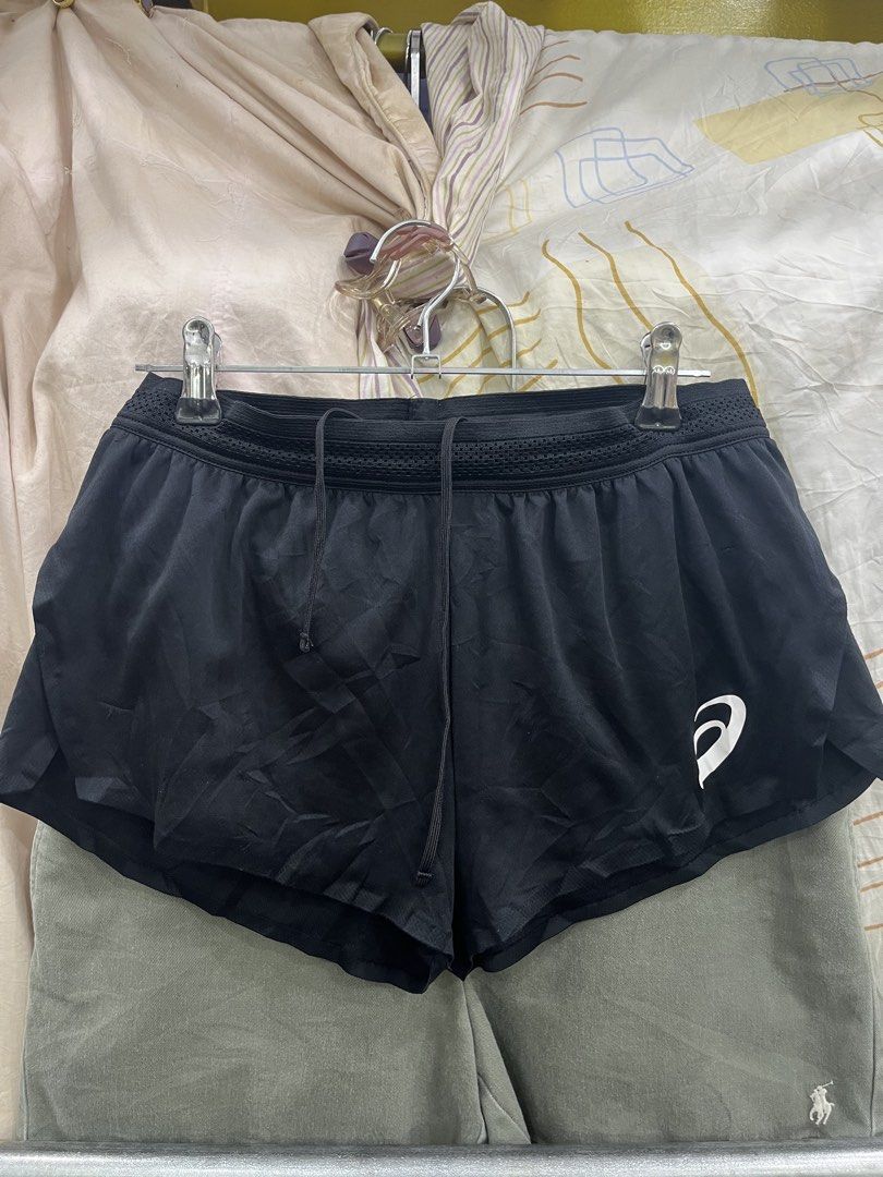 Asics Black Running Shorts Size M (Category: Shorts) located in Kidapawan. Submitted by azythrift (Listing ID 1466465448, Image 1). Description: - Brand: Asics - Size: Medium (M) - Color: Classic Black with white logo on left leg - Material: Lightweight, quick-drying polyester - Comfort: Built-in inner lining for extra coverage - Breathability: Mesh panels near the waistband - Fit: Elastic waistband with adjustable drawstring - Easy to wash and m