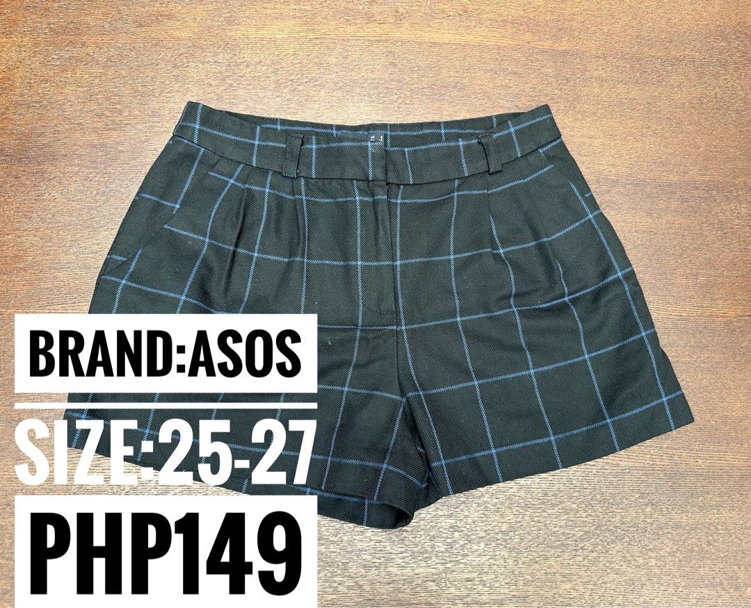 ASOS Black Blue Plaid Check Tailored Shorts (Category: Shorts) located in Bulacan. Submitted by thriftbagcollections (Listing ID 1466356455, Image 1). Description: - Brand: ASOS - Size: UK 8 / EU 36 / US 4 - Color: Black with blue plaid check pattern - Waist: Mid-rise with belt loops - Details: Pleated front and back welt pockets - Condition: Excellent structured style, perfect for casual or dressed-up looks.