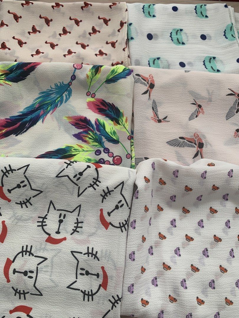 Assorted patterned bubble scarves (Category: Scarves) located in Kuala Lumpur. Submitted by asha777 (Listing ID 1466348198, Image 1). Description: - Set of 6 lightweight patterned scarves - Features cute cat faces, colorful feathers, flying birds, abstract shapes, and polka dots - Lightweight material that is easy to drape or tie - Perfect for adding a pop of pattern to plain outfits - Selling all together as a complete set.