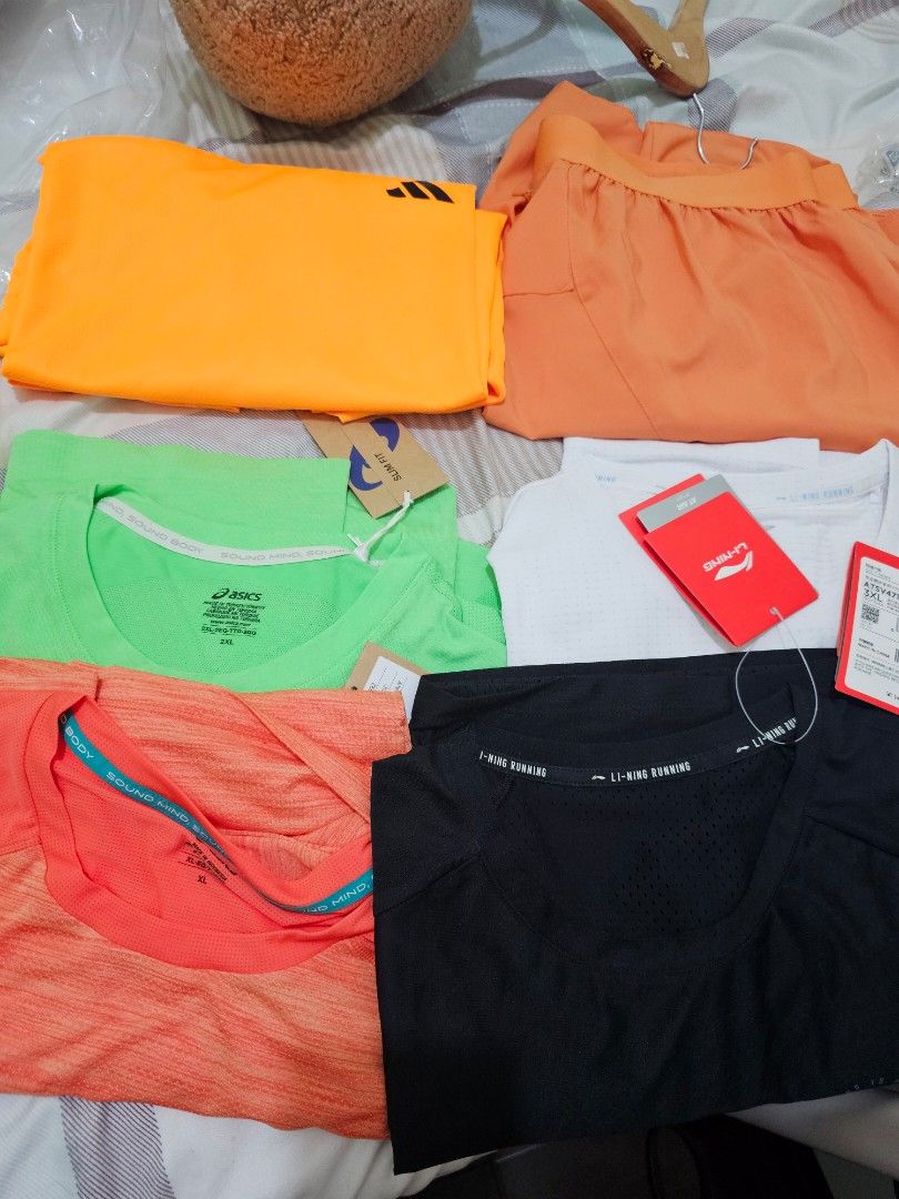 Assorted Sport T-shirts Li-Ning Asics Adidas Bundle (Category: Activewear) located in Mandaluyong City. Submitted by cyclode (Listing ID 1466383610, Image 1). Description: Green Asics Long Sleeve 2XL Slim 1700 Orange Asics XL 1500 Black Lining 3XL (fit XL or 2XL) 800 White Lining 3XL (fit XL or 2XL) 800 Adidas Shirt Yellow Orange XL Used once 650 Adidas Short Orange XL Used once 800.