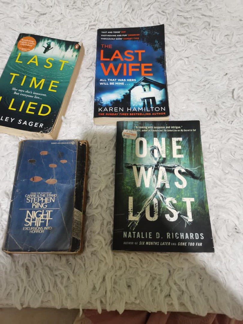 Assorted Thriller and Horror Fiction Paperback Books Set (Category: Storybooks) located in Manila. Submitted by geminibibo (Listing ID 1466524742, Image 1). Description: - Set of 4 paperback thriller and horror novels - Includes: Last Time I Lied (Riley Sager), The Last Wife (Karen Hamilton), One Was Lost (Natalie D. Richards), and Night Shift (Stephen King) - Condition: Covers show varying wear, particularly on the edges and corners of Night Shi