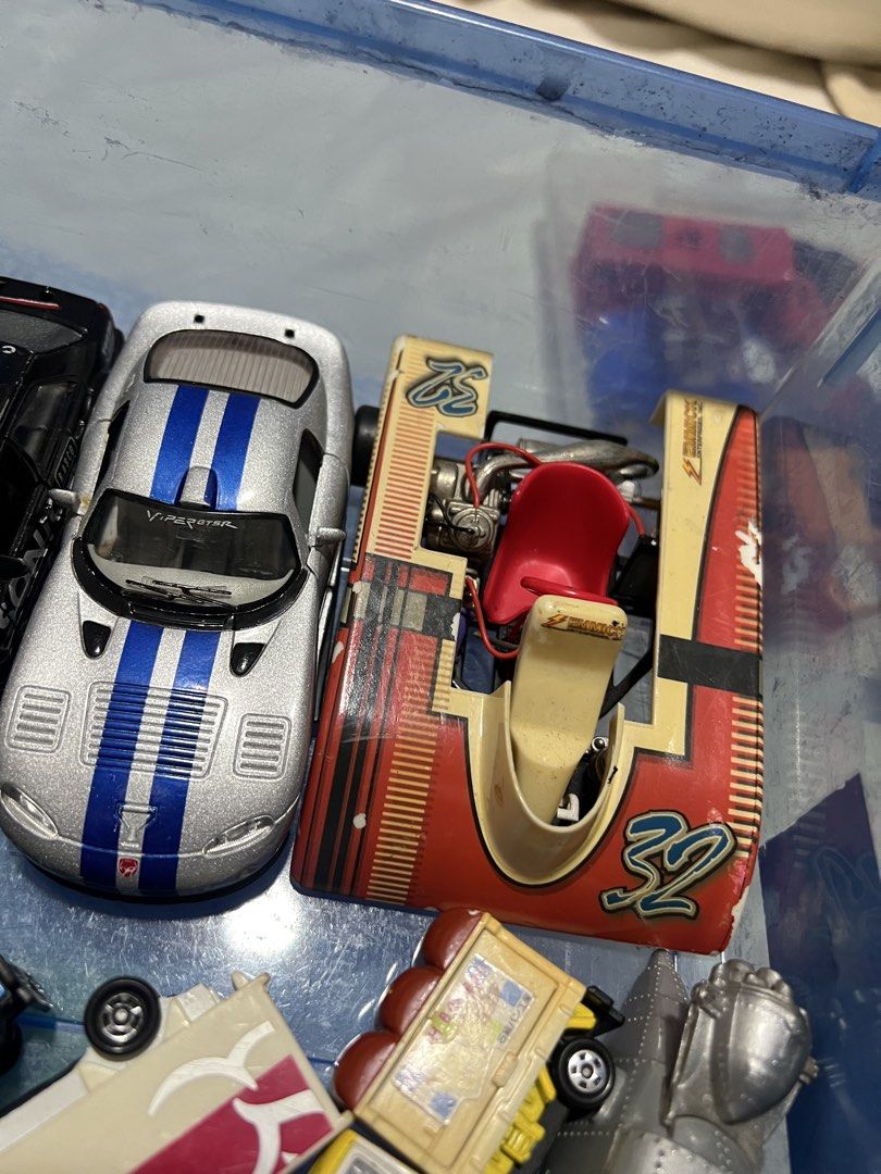 Assorted toy cars, airplanes and trucks bundle (Category: Vehicle & Diecast Models) located in Manila. Submitted by cterrineni76861 (Listing ID 1466491721, Image 2). Description: - Assorted toy vehicle lot including Hot Wheels and other brands - Features a Zest Air passenger plane, Dodge Vipers, racing cars, police cars, and a go-kart - Condition: Surface wear, scratches, and paint chips present from previous play - Ideal for collectors or playti
