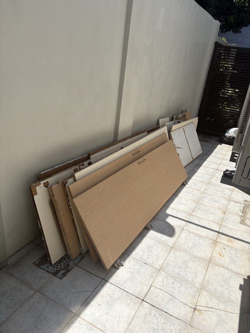 Assorted Wooden Cabinet Doors and Panels (Category: Shelves, Cabinets & Racks) located in Manila. Submitted by vastfalcon.e9558f (Listing ID 1466370174, Image 3). Description: - Variety of wooden cabinet doors and panels, great for DIY projects, repairs, or upcycling - Mix of finishes: light wood with metal handles, plain white, and primed panels - Includes hinges and hardware on select pieces - Multiple sizes available - Pickup required due to s