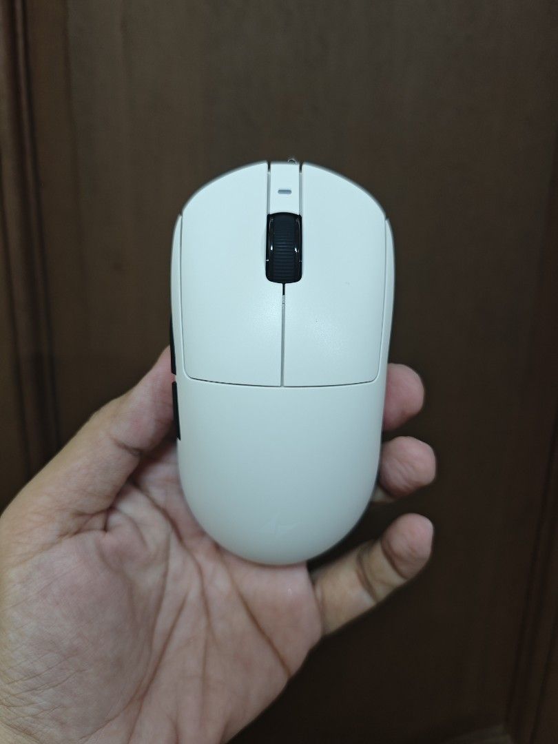 ATK A9 wireless mouse (Category: Mouse & Mousepads) located in Quezon City. Submitted by unboxingtito (Listing ID 1466470802, Image 2). Description: Brand new and unused..