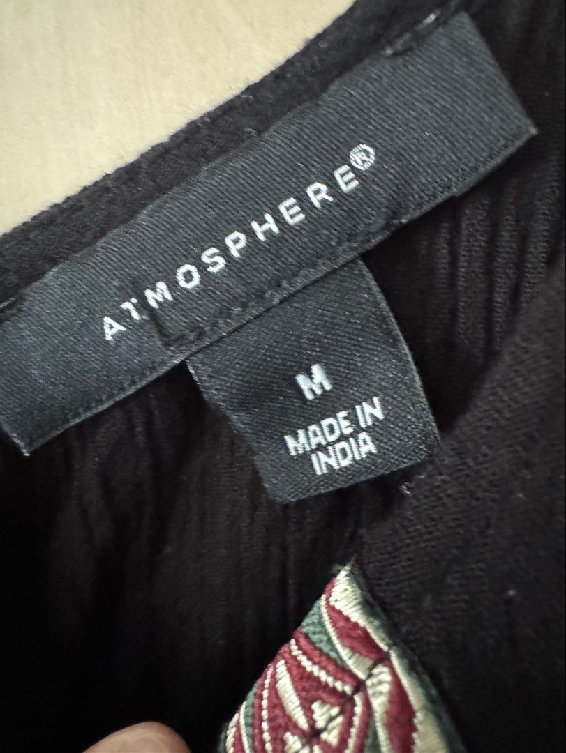 AUTH ATMOSHPHERE BOHO CHIC BLACK NICE MATERIAL AND BACK TIE ACCENT TOP BLOUSE (Category: Sleeveless) located in Pasig City. Submitted by babyiceice (Listing ID 1466363935, Image 3). Description: NO MEETS UPS***NO TRADES***NO WHEN WORN PICTURE***NO MEASUREMENTS PLS READ THE DESCRIPTION CAREFULLY AND LOOK AT THE PICTURES POSTED, NO COMPLAINTS OR REFUND WILL BE ENTERTAINED WITH ANY OF THE FLAWS POSTED OR PICTURED. ALL SALES FINAL NO RETURN NO EXCHAN