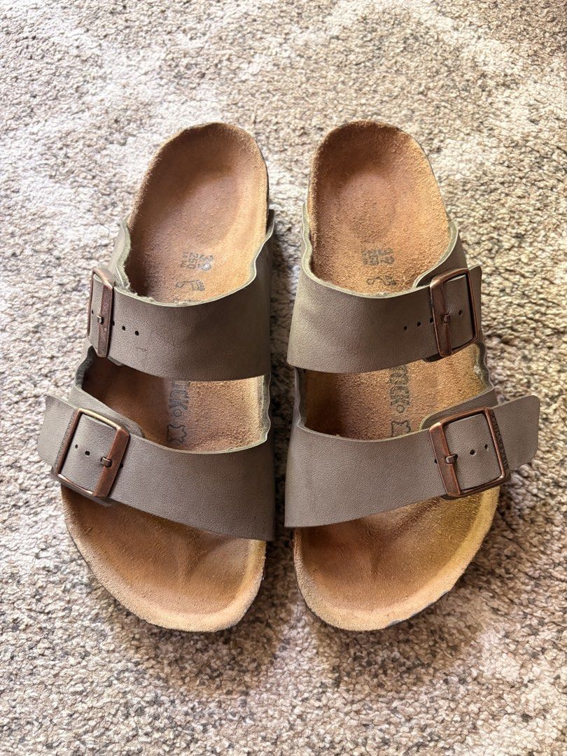Auth Preloved Arizona Birkenstock (Category: Slippers & Slides) located in Paranaque City. Submitted by silentstone.dolphin (Listing ID 1466356046, Image 1). Description: Stone Color.. Brass Buckle.. Visible Print.. Size 39RF.. Clean&Ready to Wear✅ Super Nice in Actual😍.