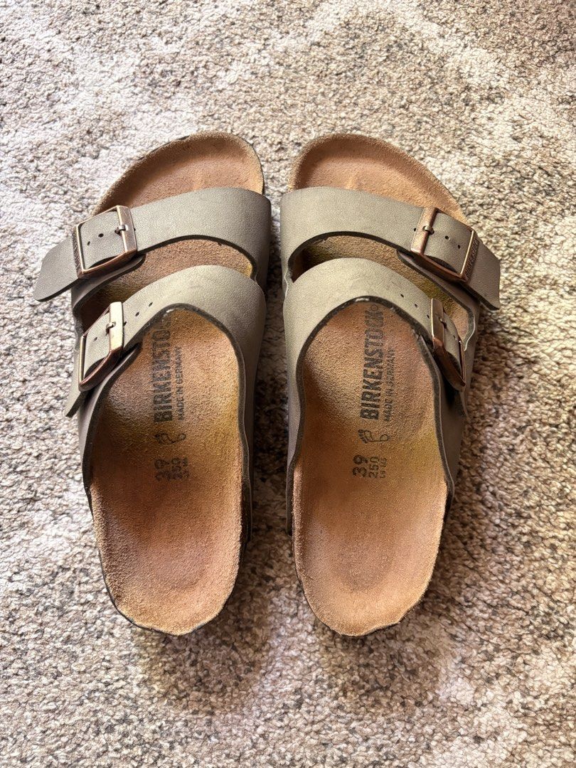 Auth Preloved Arizona Birkenstock (Category: Slippers & Slides) located in Paranaque City. Submitted by silentstone.dolphin (Listing ID 1466356046, Image 2). Description: Stone Color.. Brass Buckle.. Visible Print.. Size 39RF.. Clean&Ready to Wear✅ Super Nice in Actual😍.