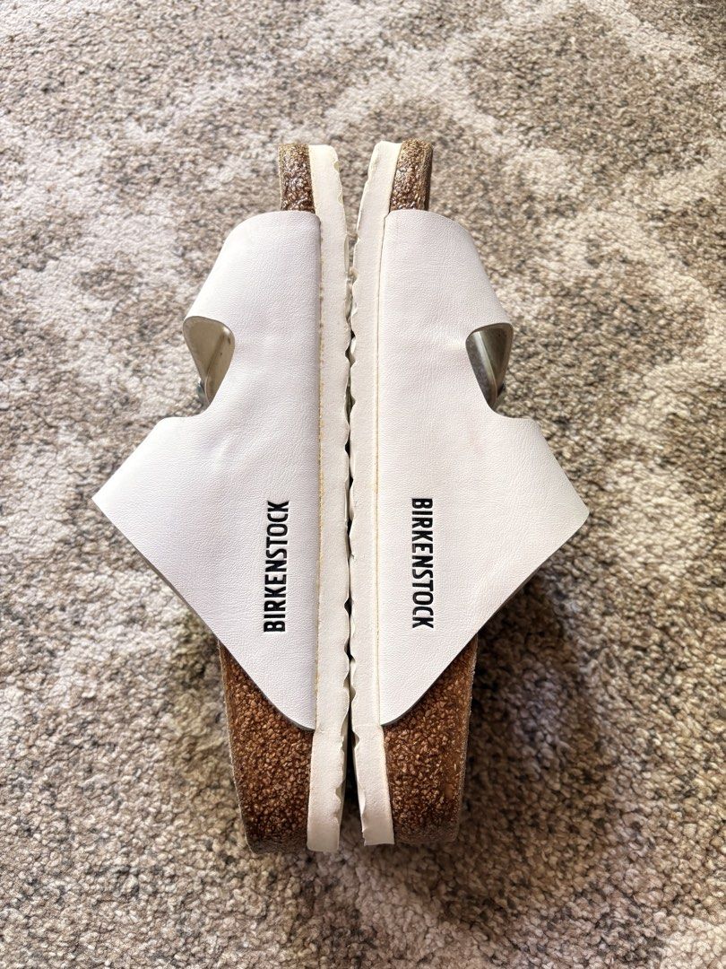 Auth Preloved Arizona Birkenstock (Category: Slippers and slides) located in Paranaque City. Submitted by silentstone.dolphin (Listing ID 1466364682, Image 3). Description: Color White Strap.. Visible Print.. Size 36N.. Clean&Ready to use..👌 Best Seller!✅ Super Pretty&Classy in Actual😍.