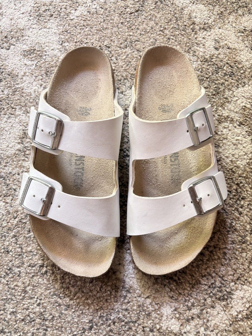 Auth Preloved Arizona Birkenstock (Category: Slippers and slides) located in Paranaque City. Submitted by silentstone.dolphin (Listing ID 1466364682, Image 1). Description: Color White Strap.. Visible Print.. Size 36N.. Clean&Ready to use..👌 Best Seller!✅ Super Pretty&Classy in Actual😍.