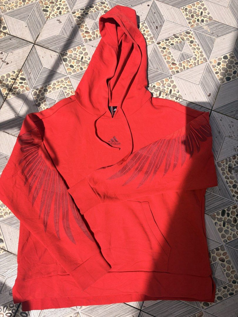 54. Authentic Adidas MIC GFX Pullover Hoodie Red (Size Asian M) (Category: Coats, Jackets and Outerwear) located in Manila. Submitted by athenabrave (Listing ID 1466392890, Image 1). Description: Selling this authentic, vibrant red Adidas pullover hoodie from their special MIC GFX line (released for the Chinese New Year collection). Features a really unique graphic pattern overlay down both sleeves that gives it a standout look. Super comfortable