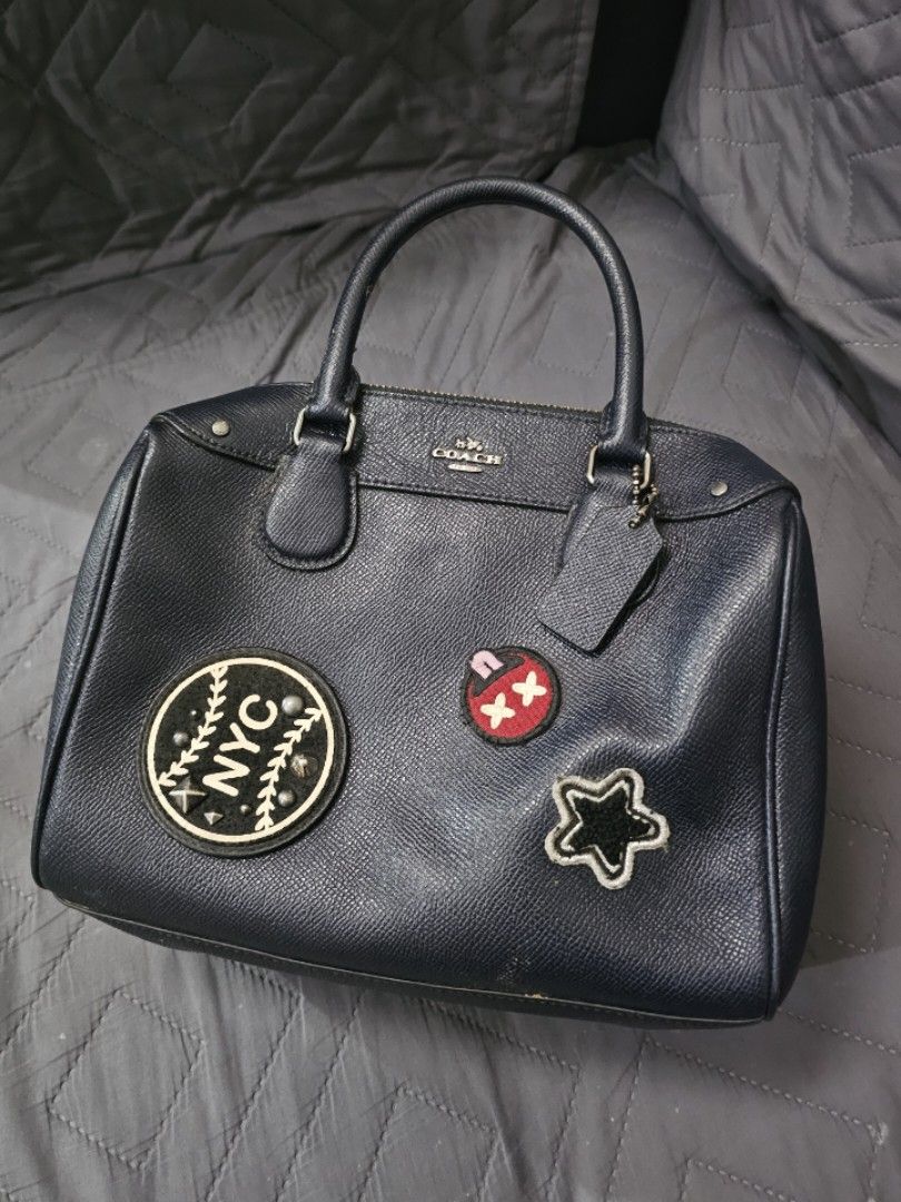Authentic Coach Varsity Patches Bag (Category: Shoulder Bags) located in Manila. Submitted by shopaholicmimi (Listing ID 1466536284, Image 1). Description: 📍preloved and in good condition (please see photos) not ergo, legacy, vintage, soho, saddle, demi, zoe, carly, eastwest, patchwork, rare, canvas, signature, laurel, hobo, kili.