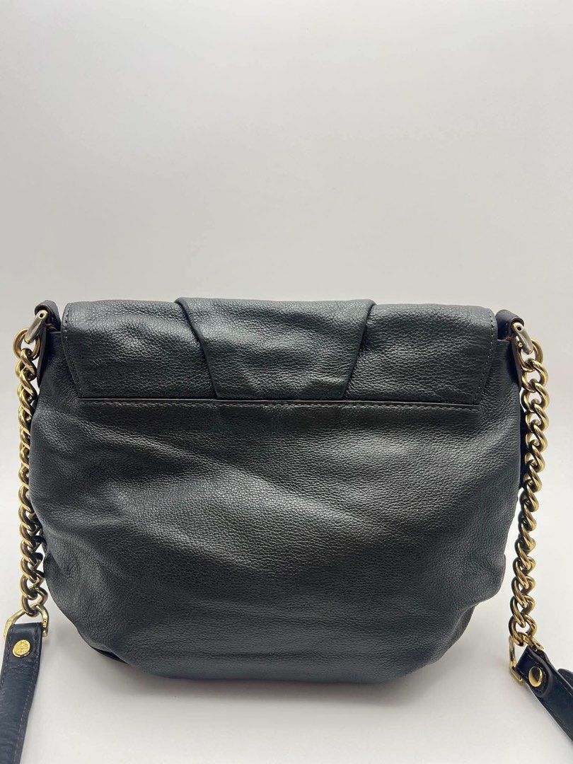 Authentic MCM Grained leather crossbody bag (Category: Cross-body Bags) located in Cagayan de Oro. Submitted by borse_de_amore (Listing ID 1466402105, Image 2). Description: Authentic MCM Grained leather crossbody bag Rank AB minimal signs of use only no issues. Has some scratches lang sa hardwares. Interior is very clean pa. Magnetic flap closure 🏷️2,880 only.