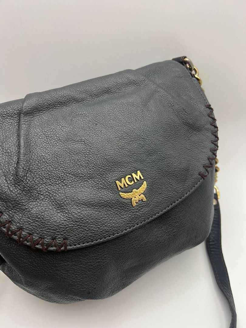 Authentic MCM Grained leather crossbody bag (Category: Cross-body Bags) located in Cagayan de Oro. Submitted by borse_de_amore (Listing ID 1466402105, Image 3). Description: Authentic MCM Grained leather crossbody bag Rank AB minimal signs of use only no issues. Has some scratches lang sa hardwares. Interior is very clean pa. Magnetic flap closure 🏷️2,880 only.