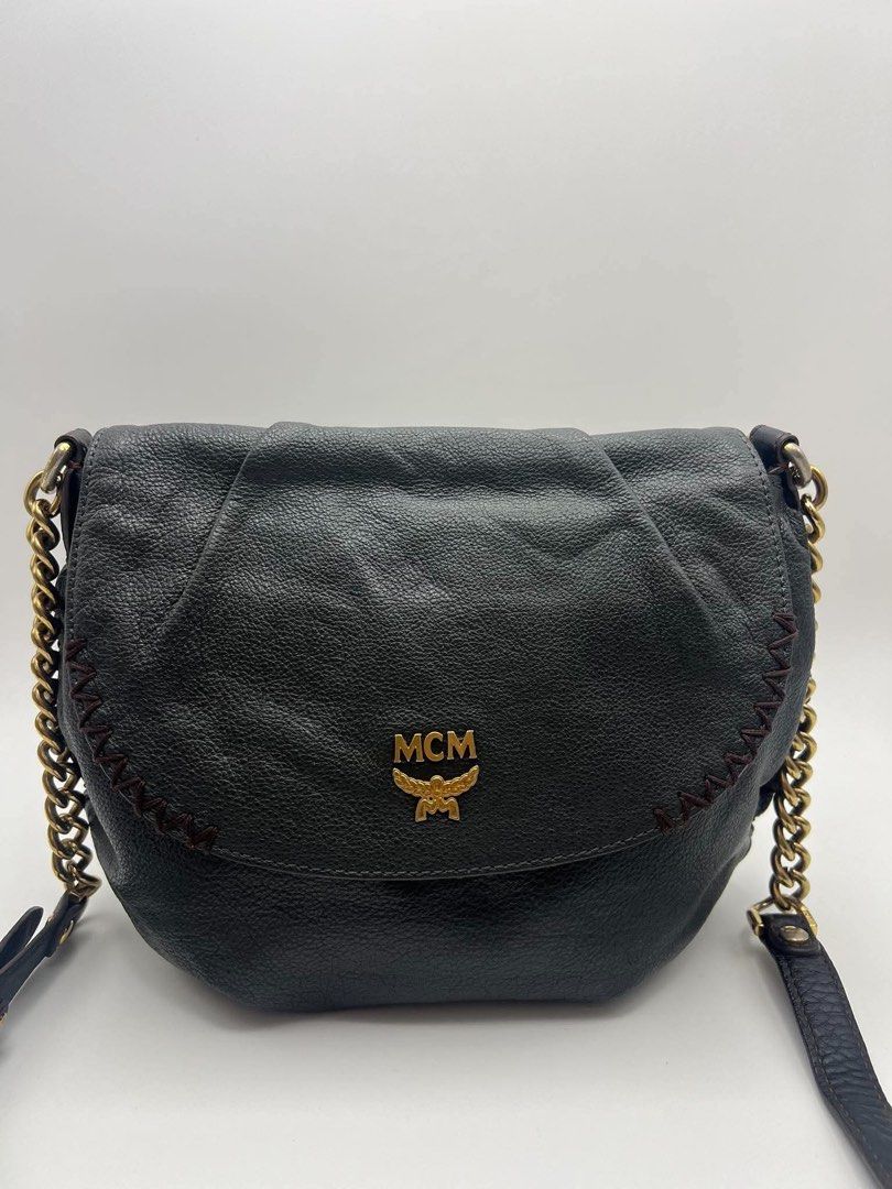 Authentic MCM Grained leather crossbody bag (Category: Cross-body Bags) located in Cagayan de Oro. Submitted by borse_de_amore (Listing ID 1466402105, Image 1). Description: Authentic MCM Grained leather crossbody bag Rank AB minimal signs of use only no issues. Has some scratches lang sa hardwares. Interior is very clean pa. Magnetic flap closure 🏷️2,880 only.