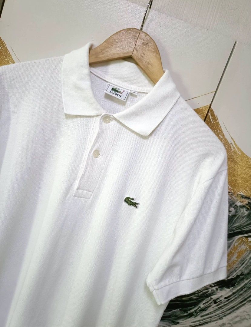 Authentic vintage polo shirt Lacoste (Category: Tshirts & Polo Shirts ) located in Magalang. Submitted by itskate_cc (Listing ID 1466470017, Image 3). Description: AUTHENTIC VINTAGE LACOSTE ACTUAL SIZE USING INCHES ARMPIT TO ARMPIT/ WIDHT 20 LENGHT/26 FITTINGS IS LARGE Excellent Condition ISSUE NO Message if you have any other question about sizing. We do shipping nation wide I'm also A open for video call so that you can see the item you 're int