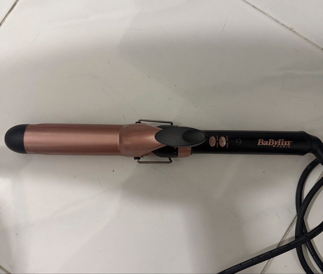 BaByliss Paris Curling Iron 32mm (Category: Hair) located in Quezon City. Submitted by 000charlie (Listing ID 1466526822, Image 1). Description: Bought for 2k Barely used .