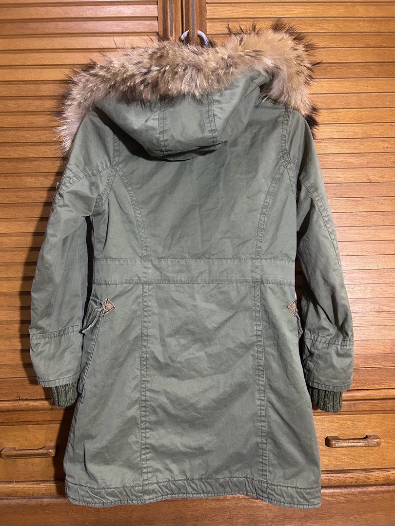 Back Number Military Troop Parka Jacket Size M (Category: Coats, Jackets and Outerwear) located in Manila. Submitted by quincy.67 (Listing ID 1466450829, Image 3). Description: - Brand/Model: Back Number military troop parka - Color: Olive green - Size: Medium - Material: Heavy cotton shell with warm fleece hood lining - Closure: Chunky zip with button storm flap - Features: Faux fur-trimmed hood, sleeve and front utility pockets, ribbed inner cu