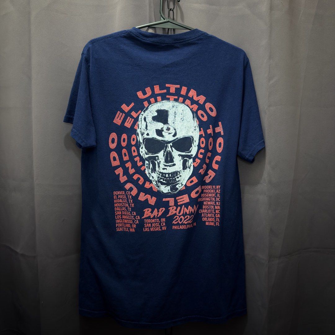 BAD BUNNY (no side stitch) (Category: Tshirts & Polo Shirts ) located in Manila. Submitted by craffee00 (Listing ID 1466348094, Image 2). Description: 🐰⚡ VINTAGE STYLE BAD BUNNY 2022 TOUR TEE ⚡🐰 Rep one of the biggest artists in the world with this Bad Bunny “El Último Tour Del Mundo” 2022 concert shirt! • Front: Vibrant graphic featuring Bad Bunny with tour branding. • Back: Sick skull graphic with full 2022 North American tour dates list. • C