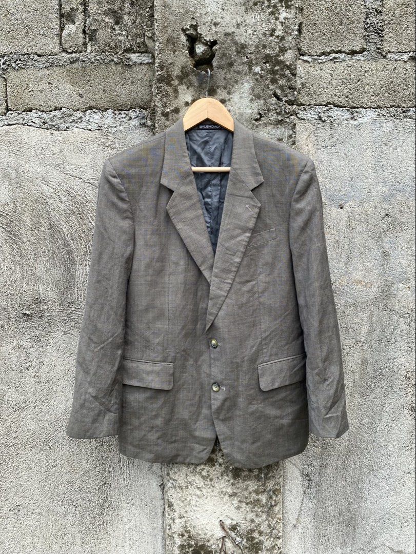 Balenciaga Wool Plaid Blazer (Category: Coats, Jackets and Outerwear) located in Manila. Submitted by why_notph (Listing ID 1466482536, Image 1). Description: - Brand: Balenciaga Pour Homme - Material: 100% premium wool - Color: Classic neutral brown with subtle blue check lines - Size: 46 (Tag attached) - Features: Structured shoulders, fully lined interior, notch lapels, and clean tailoring - Condition: Excellent pre-loved condition, ready to w
