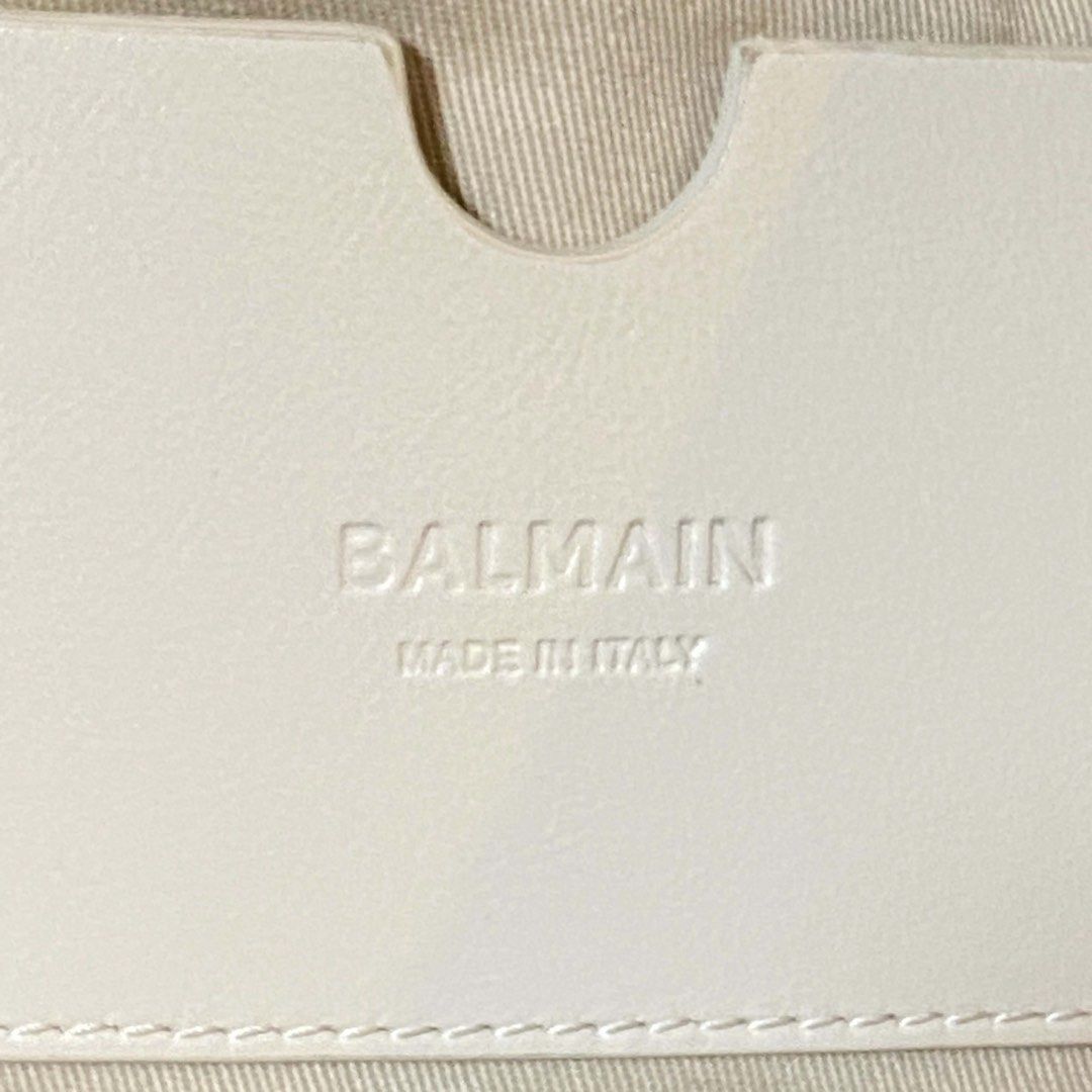 Balmain 1945 Soft Small Shoulder Bag White (Category: Shoulder Bags) located in Quezon City. Submitted by pialprds (Listing ID 1466424944, Image 2). Description: BALMAIN 1945 SOFT TOTE BAG IN CRACKLED CALFSKIN Retail price $2,895 USD Bought July 2026 from Neiman Marcus US Only used once comes with its original dust bag $2,895 USD \ ₱181,516 PHP Retail price tax not included Discount for sure buyers! ☺️ RFS: Decluttering.