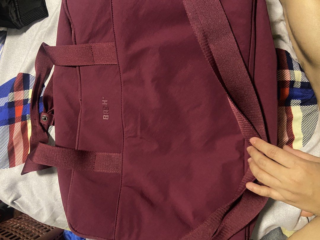 BASH Expedition Weekender Mono in Jet Set (Limited Edition) (Category: Sling Bags) located in Quezon City. Submitted by angelshopssells (Listing ID 1466461543, Image 1). Description: Used twice, bought for ₱2900 at Tiktok Shop All zipper covers still on With the small pouch Complete with original packaging and dust bag RFS: gifted another bag for travel BASH - Color: Maroon - Material: Smooth, durable fabric with branded pull tabs - Compartments:
