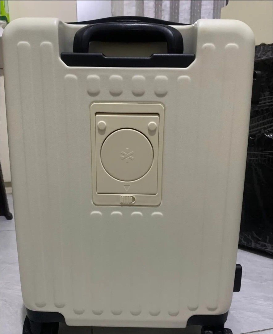 Bash Handcarry luggage (Category: Luggage) located in Manila. Submitted by ann261 (Listing ID 1466359633, Image 3). Description: handcarry luggage - Brand: Bash - Color: Off-white beige - Size: Compact cabin size (ideal for short trips) - Wheels: Smooth-rolling spinner wheels - Special Feature: Integrated cup holder / storage compartment on the back panel - Condition: Clean inside and out - Inclusions: Original branded dust cover bag.