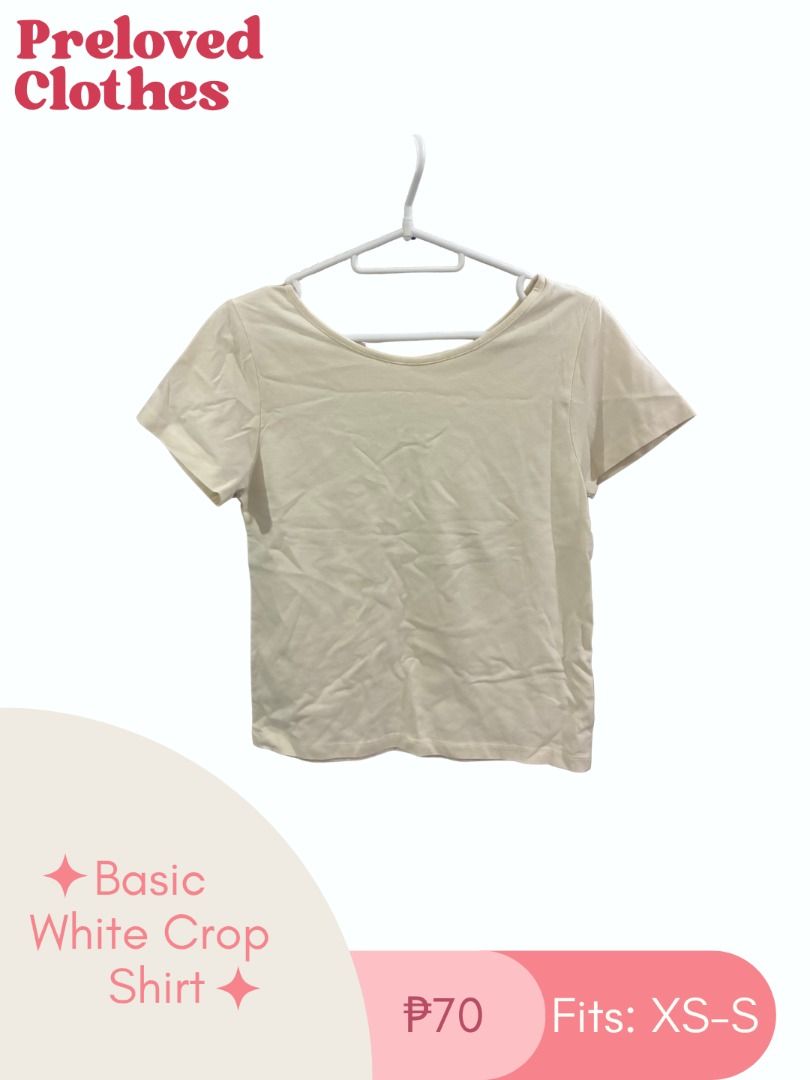 Basic White Crop Shirt (Category: Shirts) located in Talisay. Submitted by garage.ia (Listing ID 1466415917, Image 1). Description: Simple white crop shirt on a hanger. Short sleeves, round neckline, standard basic cut. Fits extra small to small frames easily. Versatile piece for daily outfits, pairs well with high-waisted jeans or skirts. Clean fabric, ready to wear..