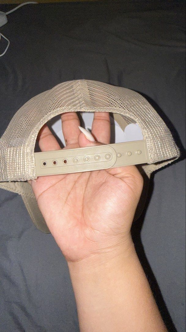 Bass Pro Shops Trucker Hat Snapback Tan White (Category: Caps & Hats) located in Andop. Submitted by nobleangel (Listing ID 1466502008, Image 2). Description: - Authentic Bass Pro Shops trucker hat (Style BPS3254) - Classic tan and white colorway with embroidered bass fish logo - Breathable mesh back panels for all-day comfort - Adjustable plastic snapback closure for a custom fit - One size fits most adults - Clean structured crown and curved br