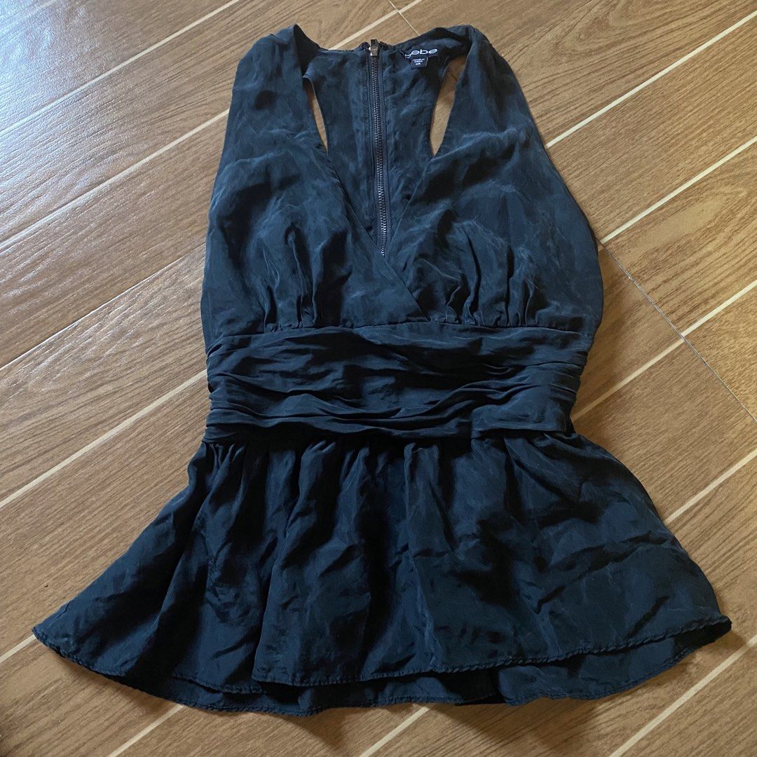 BEBE halter neck peplum top (Category: Sleeveless) located in Paete. Submitted by fat.archives (Listing ID 1466387026, Image 1). Description: Dimes Bust 14 Length 22 +sf.