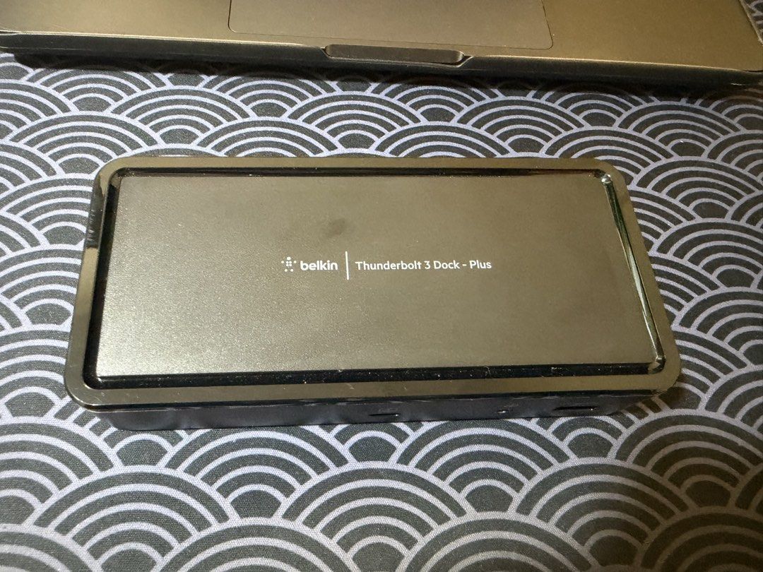 Belkin Thunderbolt 3 Dock Plus F4U109 (Category: Cables & Adaptors) located in Santa Cruz. Submitted by dcbacarro (Listing ID 1466523563, Image 2). Description: - Model: Belkin Thunderbolt 3 Dock Plus (F4U109) - Color: Sleek black finish - Condition: Clean unit with legible bottom label - Back Ports: Ethernet, USB-A, USB-C, dual DisplayPort, and power input - Front Ports: USB-C, USB-A, and audio jack - Perfect for expanding laptop connectivity an