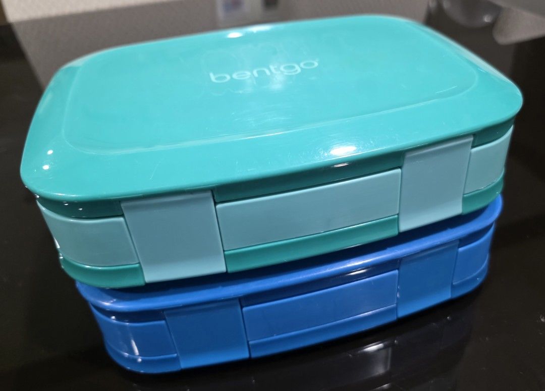 2pcs Bentgo Kids Lunch Box Set (Category: Weaning & Toddler Feeding) located in Pasay City. Submitted by glc08 (Listing ID 1466487490, Image 2). Description: - As is on photo - Set of 2 Bentgo kids lunch boxes (Teal/Light Teal and Solid Blue) - 4 leak-proof compartments in each box to keep foods separated - Secure locking clips on the front for mess-free transport - Ideal for school lunches, daycare, and snacks on the go - Selling together as a v