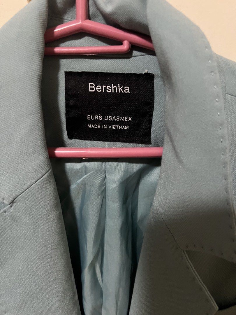 Bershka Light Blue Double Breasted Blazer Jacket (Category: Coats, Jackets and Outerwear) located in Pasig City. Submitted by notyouraveragestuff (Listing ID 1466464906, Image 2). Description: - Brand: Bershka - Style: Double-breasted blazer with structured fit - Color: Light blue (fully lined interior) - Features: Classic lapel collar, front button closures, flap pockets, decorative sleeve buttons, and back slit vent - Origin: Made in Vietnam - 
