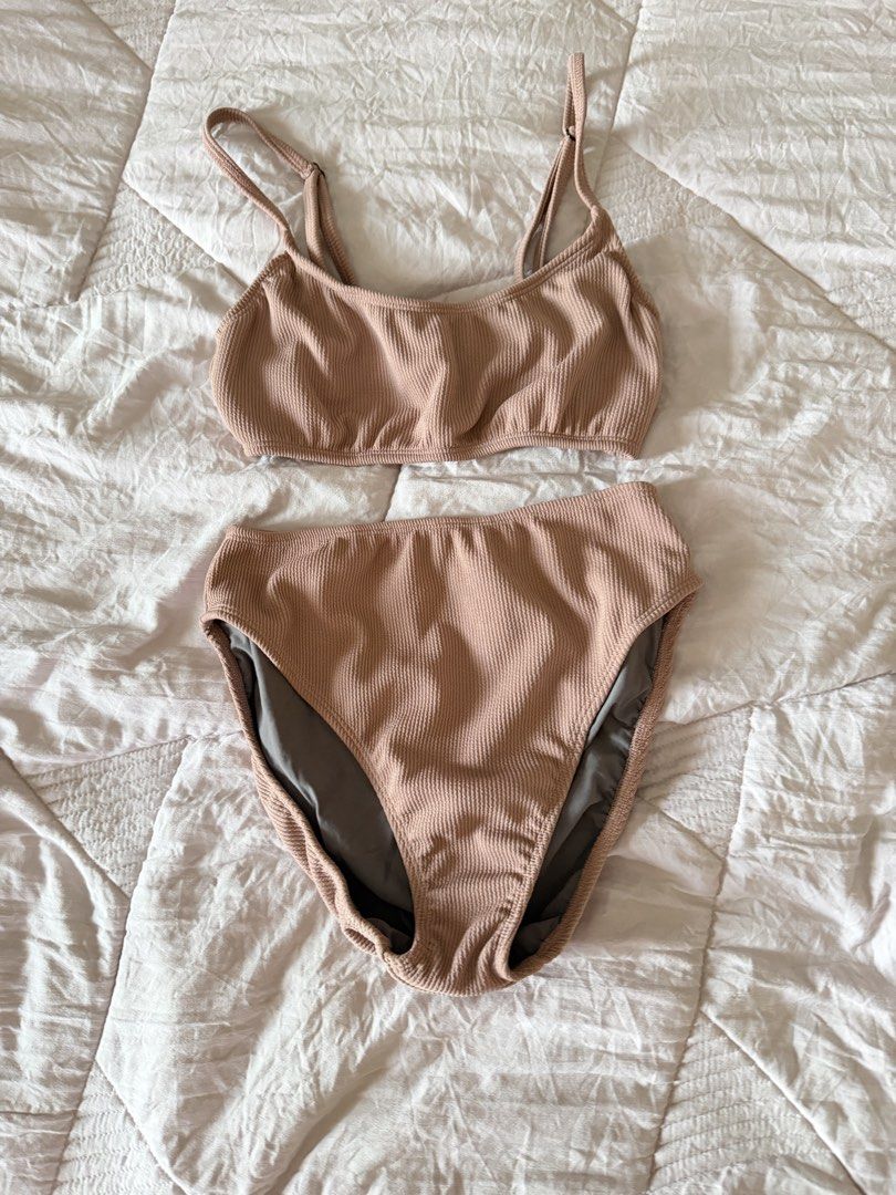 Bikini Sets Bundle Three Pieces Women Swimwear (Category: Bikinis & Swimsuits) located in Taytay. Submitted by gvccloset (Listing ID 1466352465, Image 3). Description: - Set of 3 trendy bikini sets for one great price - 1st set: White one-shoulder top with matching bottoms - 2nd set: Beige strapped top with flattering high-waisted bottoms - 3rd set: Ribbed pinkish-brown set with adjustable straps - All pieces feature flattering high-waisted cuts 