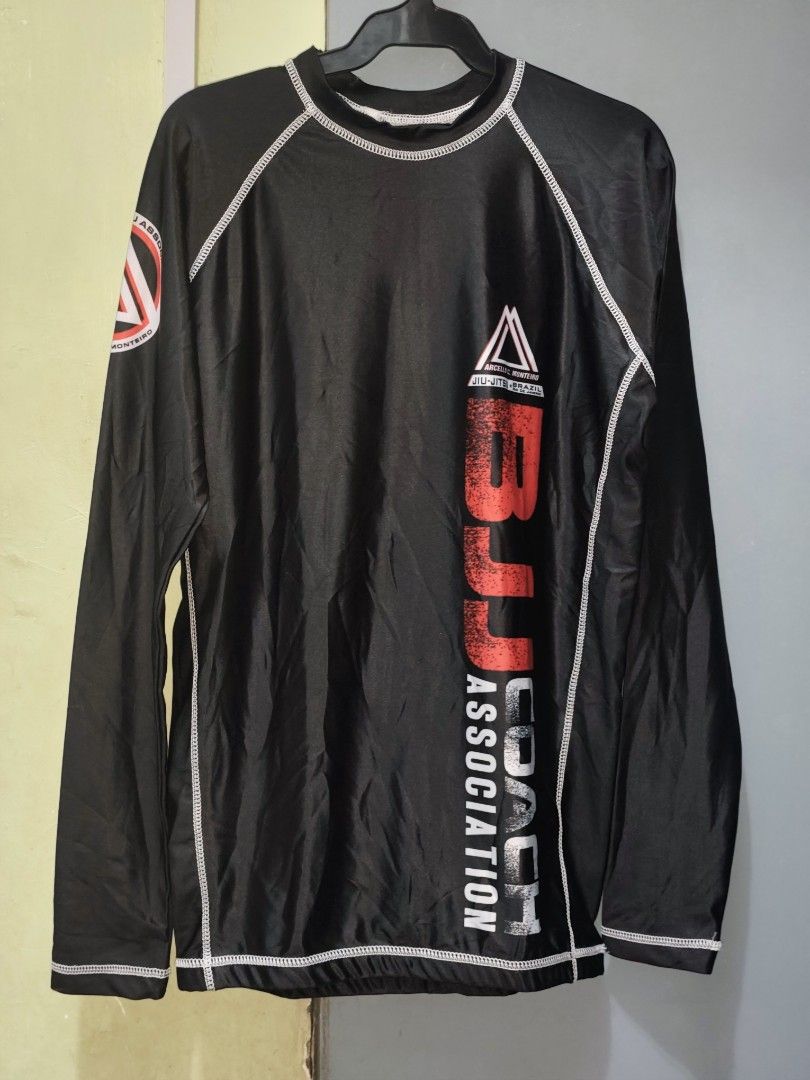 BJJ COACH ASSOCIATION RASH GUARD (M) (Category: Combat Sports) located in Taguig. Submitted by mmthriftshop.ph (Listing ID 1466358050, Image 2). Description: 🥋 BJJ COACH ASSOCIATION RASH GUARD 💵 750.00 + SF 📏Size: MEDIUM ➡️ Length - 27 inches (neck to hem) ➡️ Width - 39-40 inches ( pit-to-pit) ➡️ Arm Sleeve - 30 inches (neck to wrist) ❌ NOT COD/COP. ✅ Payment first policy. 🏷️ Excellent used condition and no issue. 📦 Shipping via Lalamove or 