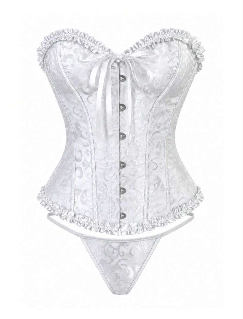 Black and White Corset Top (Category: Sleeveless) located in Taguig. Submitted by sellsbynix (Listing ID 1466518532, Image 1). Description: - Color: White - Design: Subtle floral brocade pattern with delicate ruffle trim - Closure: Front busk with metal clasps and center ribbon tie - Fit: Structured with full boning for a flattering silhouette - Inclusions: Matching thong included in the white set - Condition: Brand new - Perfect for halloween, e