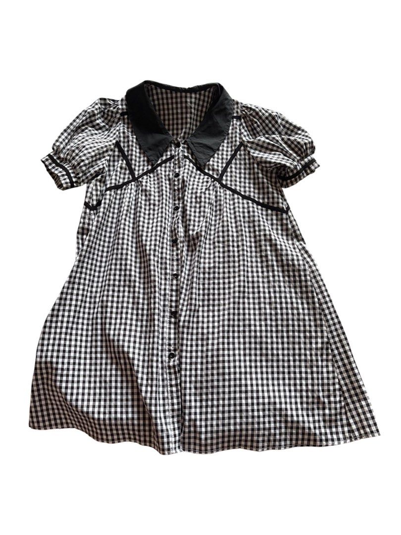 Black and White Gingham Dress with Peter Pan Collar (Category: Dresses) located in Mandaluyong City. Submitted by katsulist (Listing ID 1466430033, Image 1). Description: Black and white gingham babydoll dress with puff sleeves, button-down front. Flowy and loose, comfortable fit. Only issue is loose threads. Width: Up to 23 inches Length: 36 inches Arm hole: 5.5 inches.