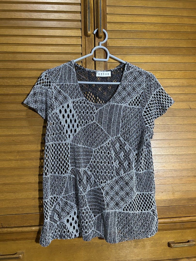 Black and white patterned knit mesh short sleeve top (Category: Blouses) located in Manila. Submitted by quincy.67 (Listing ID 1466446420, Image 1). Description: - Style: Black and white knit mesh top - Details: V-neckline, short sleeves, geometric open-work crochet pattern all over - Fabric: Semi-sheer, lightweight, and breathable - Fit: Great layering piece - Condition: Excellent, ready to wear.