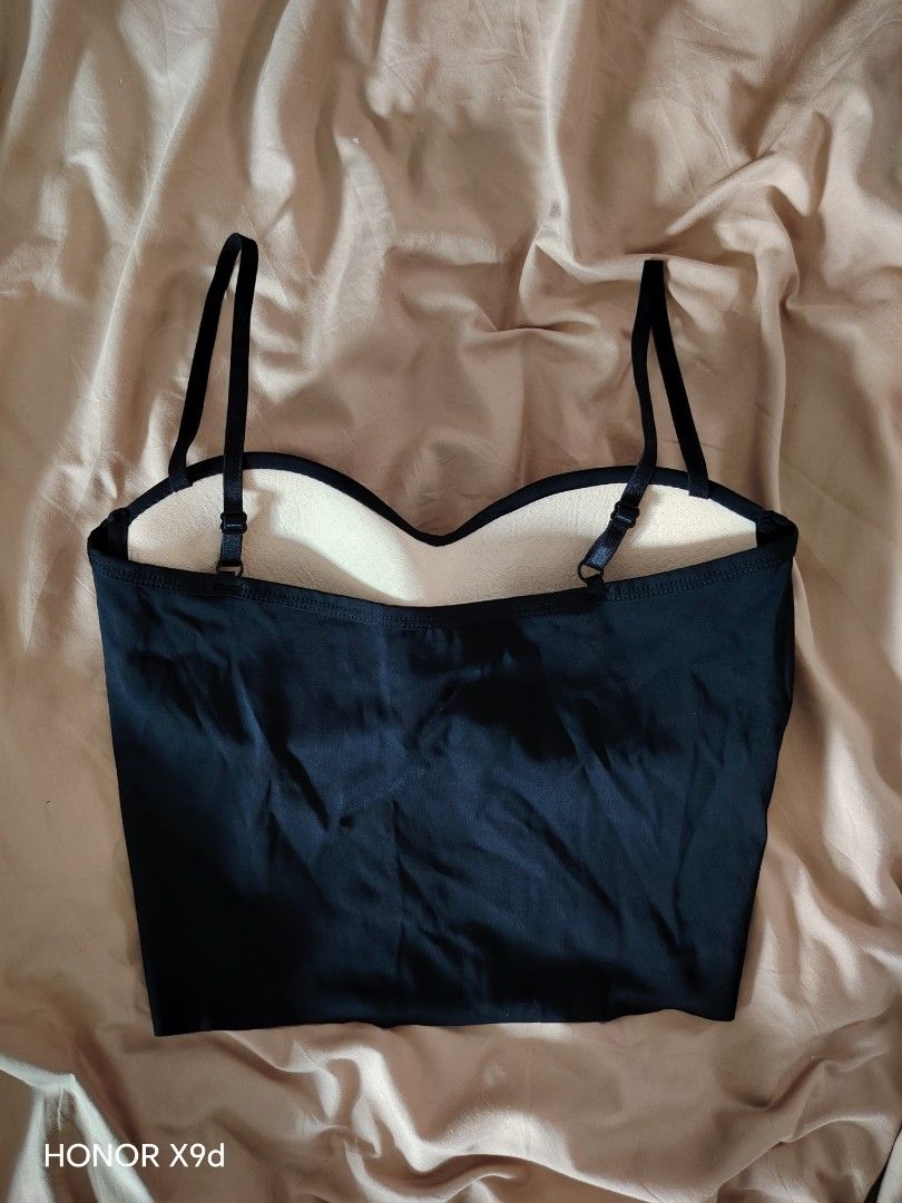Black Camisole Croptop with Built-in Bustier (Category: Sleeveless) located in Mabalacat. Submitted by Jackikay.PreLoved (Listing ID 1466425638, Image 2). Description: - XS-S - Color: Black with light cream pads - Style: Cropped camisole with built-in padded bustier cups - Neckline & Straps: Sweetheart neckline with adjustable shoulder straps and straight-cut back - Material: Smooth, seamlesss, stretchy fabric.