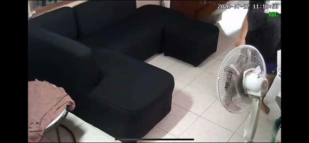 Black L-shaped sectional sofa with matching cushions (Category: Sofas) located in Mandaluyong City. Submitted by bambi14 (Listing ID 1466430443, Image 1). Description: - Type: Black fabric L-shaped sectional sofa with matching movable ottoman / Only bought las January 2026 - Includes: Grey scatter cushions and one large tufted black floor cushion - Condition: Clean upholstery with minimal wear, very comfortable - Ideal for: Living room spaces and