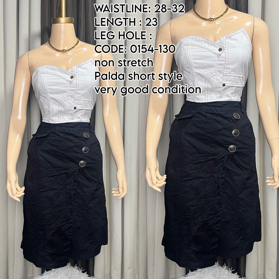 Black skort with buttons (Category: Shorts) located in Naga. Submitted by rmapprl (Listing ID 1466493320, Image 1). Description: - Skirt style: Palda short with trendy side button details - Fabric: Non-stretch - Waistline: Fits 28 to 32 inches - Length: 23 inches - Item Code: 0154-130.