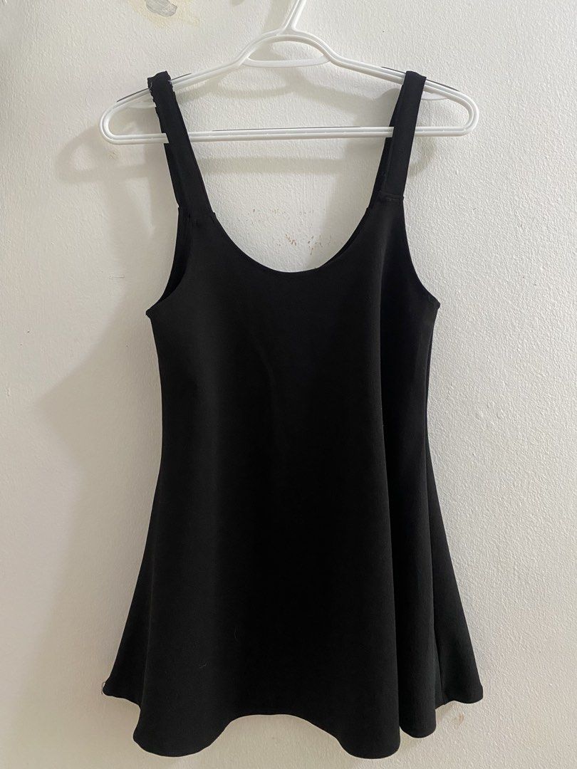 Black sleeveless top with front zipper (Category: Dresses) located in Cavite. Submitted by renjamore (Listing ID 1466364509, Image 2). Description: sleeveless dress with zipper, perfect for layering fits sizes s-m slight issue: sewn straps to make it shorter dm for more inquiries :D.