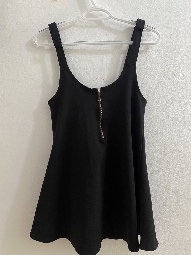 Black sleeveless top with front zipper (Category: Dresses) located in Cavite. Submitted by renjamore (Listing ID 1466364509, Image 1). Description: sleeveless dress with zipper, perfect for layering fits sizes s-m slight issue: sewn straps to make it shorter dm for more inquiries :D.