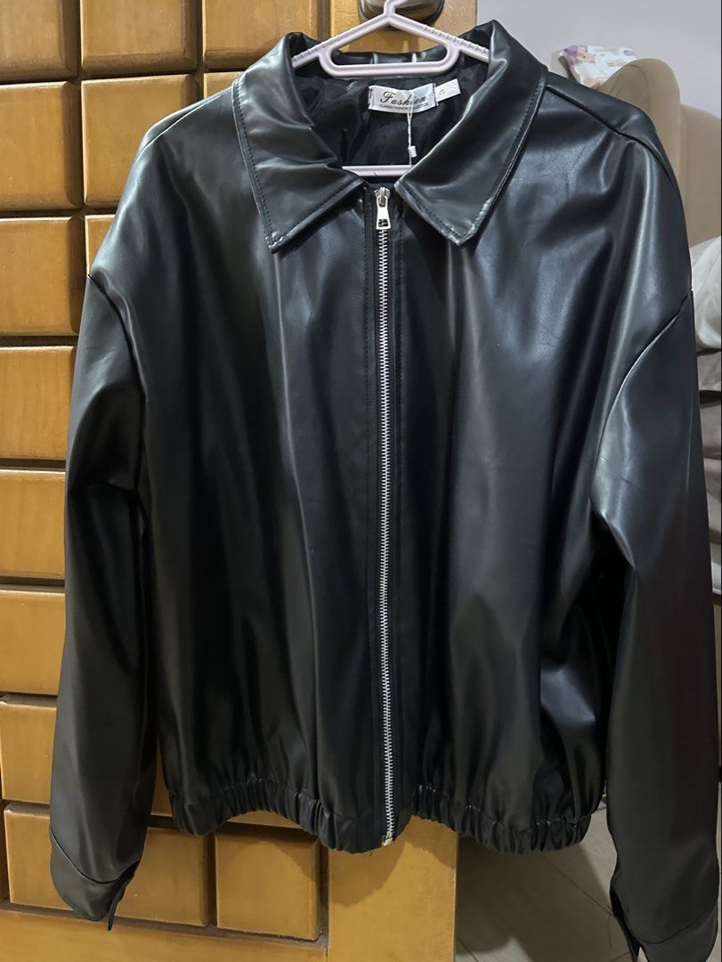 Black soft Leather Jacket (Category: Coats, Jackets and Outerwear) located in Cabanatuan. Submitted by ldej20 (Listing ID 1466357853, Image 1). Description: bnew with tag bought 1200 large on tag rfs : di umabot sa trip .