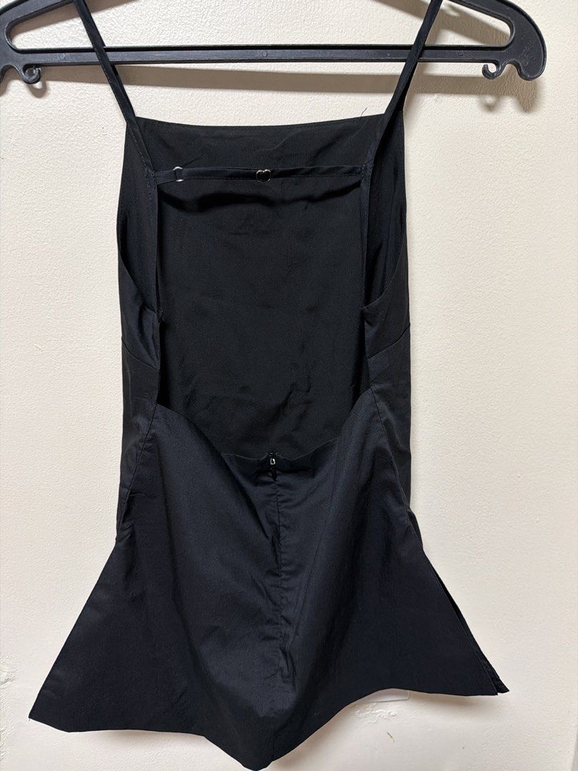 Black Spaghetti Strap Open Back Peplum Top (Category: Sleeveless) located in Los Banos. Submitted by sashimituna (Listing ID 1466450823, Image 2). Description: - Color: Solid black - Design: Spaghetti strap with square neckline - Back Details: Open back with a horizontal strap and stylish metal hardware - Closure: Convenient zipper at the lower back seam - Hemline: Flattered flared peplum hem for extra shape - SF: Buyer shoulders shipping fee.