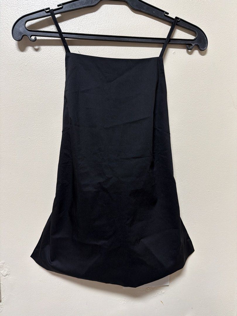 Black Spaghetti Strap Open Back Peplum Top (Category: Sleeveless) located in Los Banos. Submitted by sashimituna (Listing ID 1466450823, Image 1). Description: - Color: Solid black - Design: Spaghetti strap with square neckline - Back Details: Open back with a horizontal strap and stylish metal hardware - Closure: Convenient zipper at the lower back seam - Hemline: Flattered flared peplum hem for extra shape - SF: Buyer shoulders shipping fee.